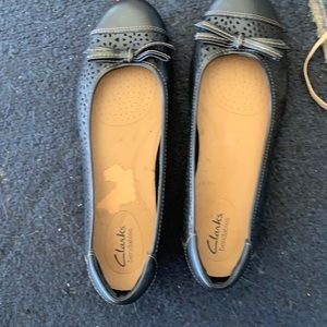 Brand new black leather Clark flat shoes very cute